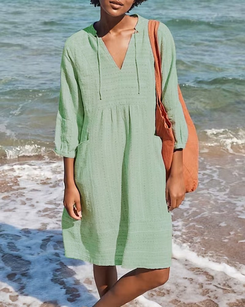 Stylish women's summer midi dress, V-neck bohemian design, perfect casual and vacation beachwear.