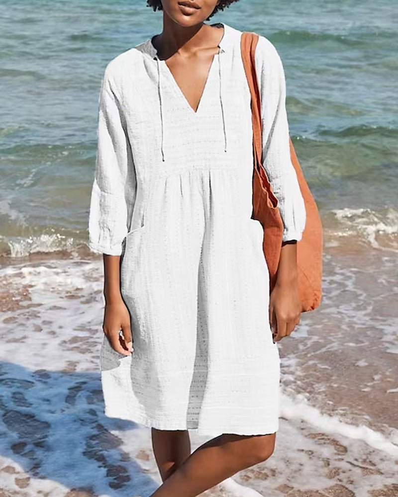 Relaxed fit V-neck bohemian midi dress for women, lightweight summer wear, suitable for beach & casual style.