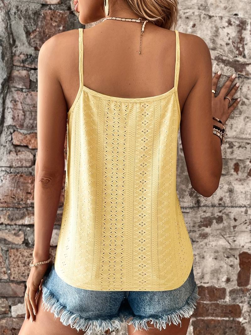 Feminine women's V-neck cami top featuring intricate lace trim. A stylish and comfortable sleeveless summer piece.