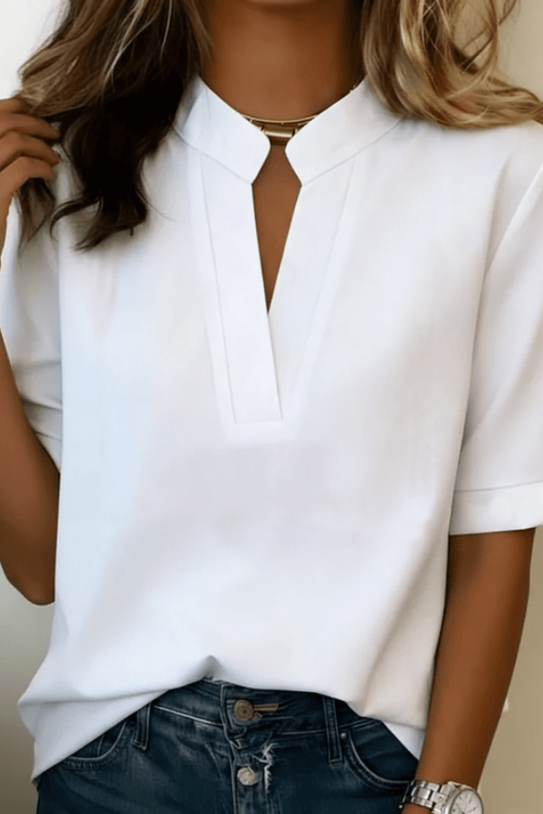 Flattering V-neck women's top, designed for sophisticated style and effortless everyday elegance.