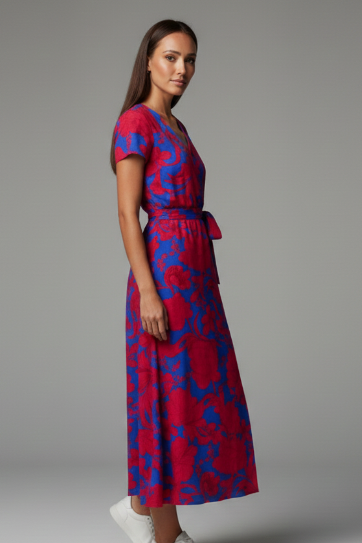 Knee-length women's dress with V-neckline & chic ruffled sleeves, perfect for sunny days.