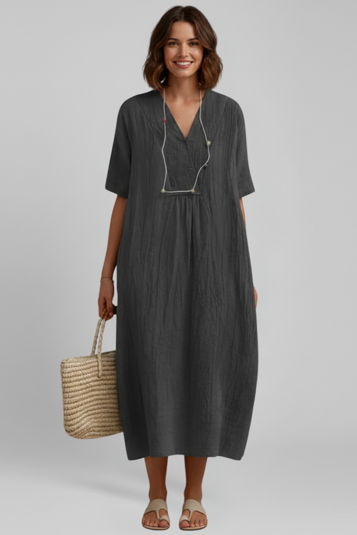Stylish women's V-neck dress, knee-length cut, ruffled sleeves, sophisticated casual look.