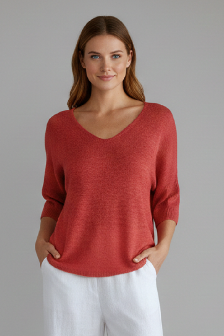 Versatile women's V-neck top with elbow sleeves for everyday wear. Relaxed fit pullover style.