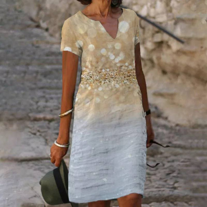 Model wearing a women's v-neck floral print summer dress, perfect for casual outings, comfortable and elegant