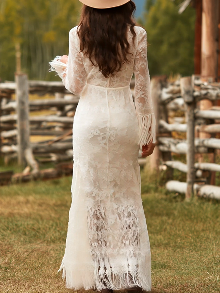 Stunning V-neck fringe hem maxi dress, a long sleeve elegant gown for evening wear.