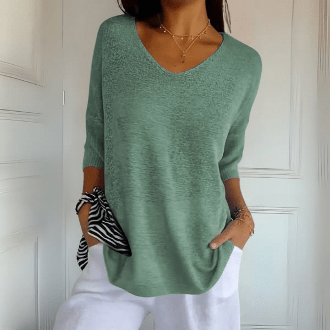 Comfortable women's V-neck pullover sweater, loose fit for effortless everyday fashion & layering.