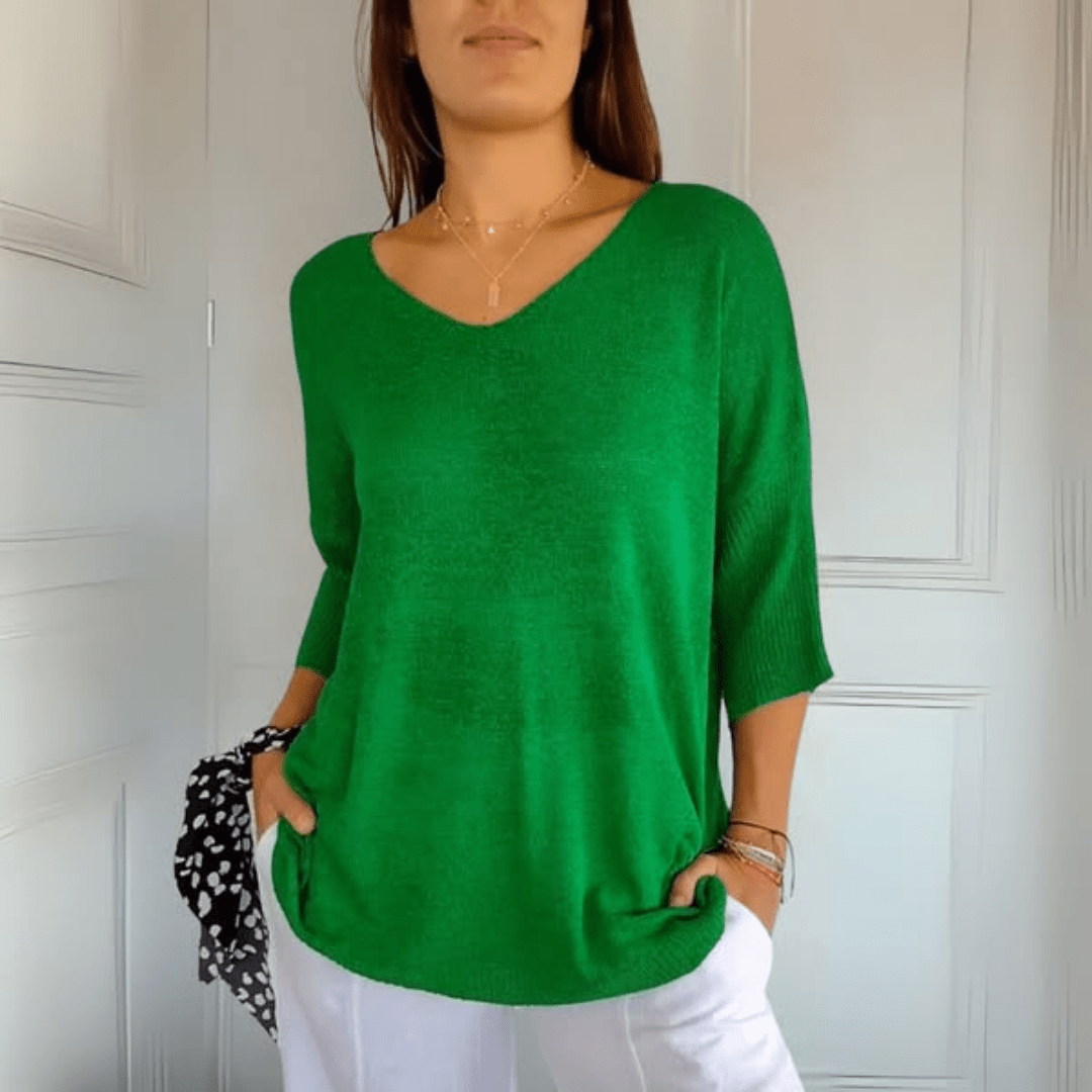 Chic women's V-neck sweater, loose silhouette, three-quarter sleeve design. A comfortable casual pullover.