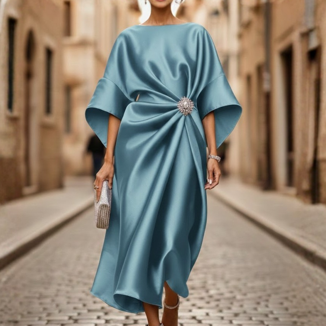 Versatile women's midi dress with V-neckline, elbow sleeves, and a stylish flared skirt, great for spring.