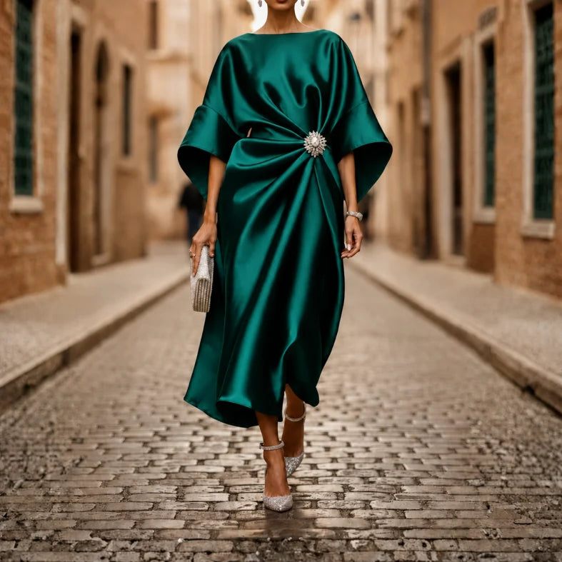 Casual women's V-neck midi dress, designed with elbow sleeves and a chic flared skirt for everyday wear.