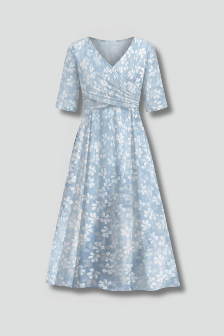 Women's V-neck midi dress with practical side pockets & short sleeves, ideal for summer casual style.