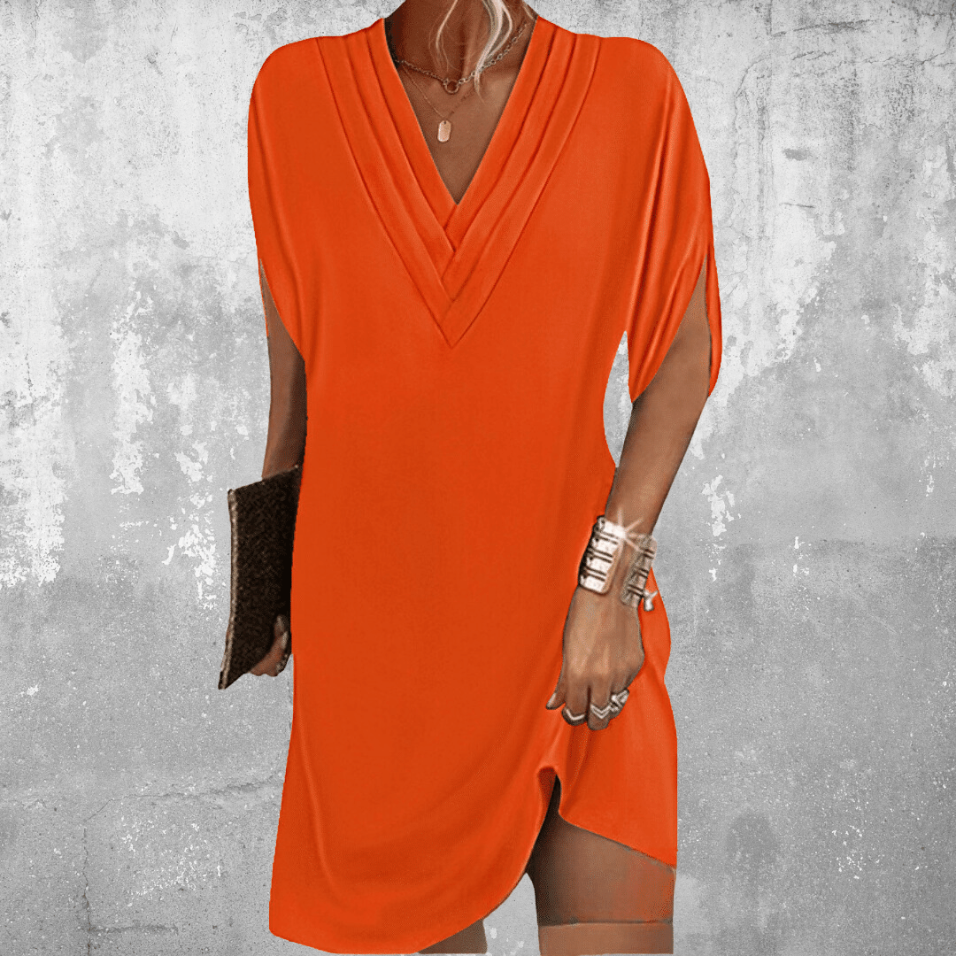 Above-knee V-neck mini dress for women, showcasing flowy sleeves. A versatile chic dress, perfect for summer parties.