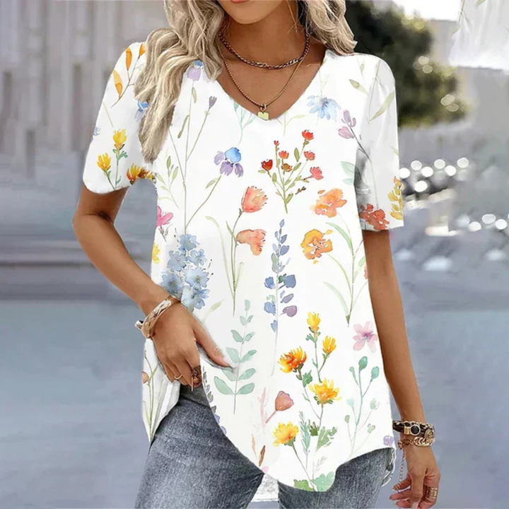 Women's V-neck printed design T-shirt, perfect for casual summer wear. Short sleeve fashion top with unique graphic.