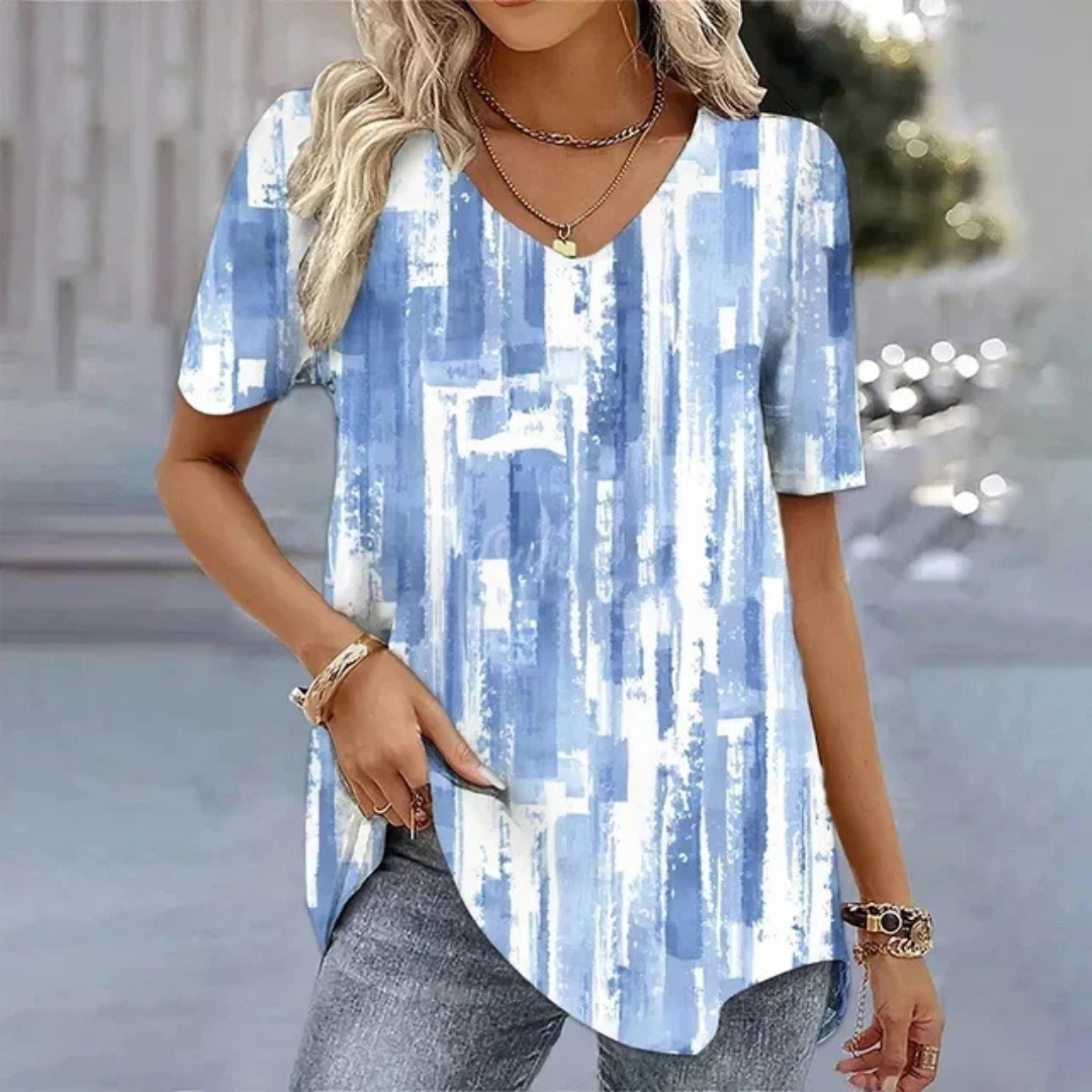 Fashionable women's V-neck t-shirt featuring a unique printed design, ideal casual summer top for her.