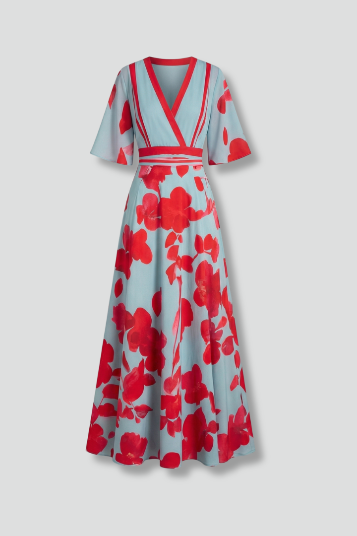 Women's V-neck printed maxi dress with flutter sleeves & wrap waist. Elegant, flowy summer dress.