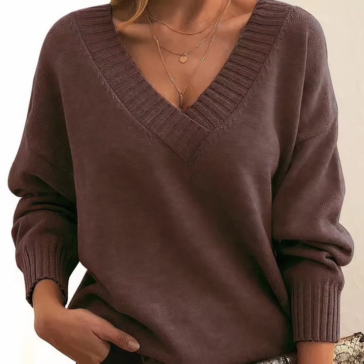 Winter style women's V neck ribbed sweater. Relaxed fit long sleeve, cozy & chic everyday fashion.