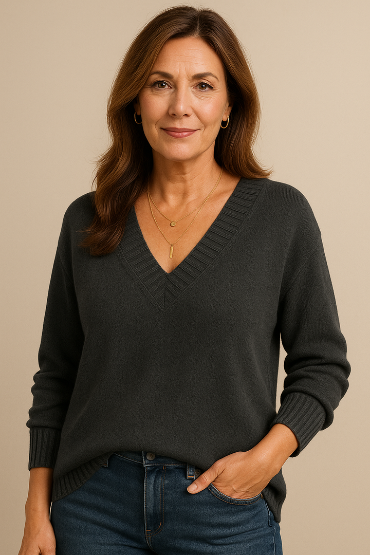 Women's V neck long sleeve pullover. Ribbed knit, relaxed fit, ideal for casual and cozy fall wear.