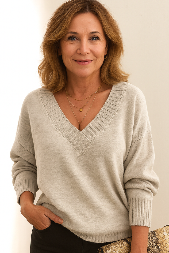 Comfortable women's V neck ribbed sweater. Relaxed fit, long sleeve, a versatile piece for daily fashion.