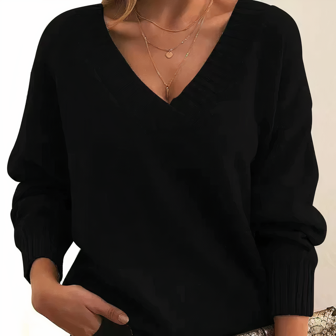 Stylish women's V neck long sleeve sweater. Ribbed knit, relaxed fit, a chic everyday pullover.
