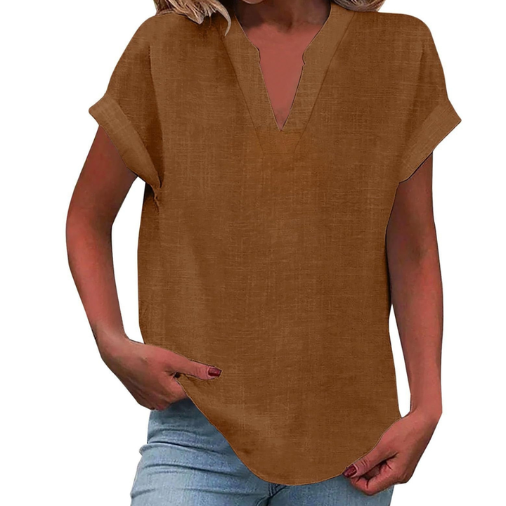 Plain women's V-neck blouse, short sleeves, offering comfort and style for spring & summer.
