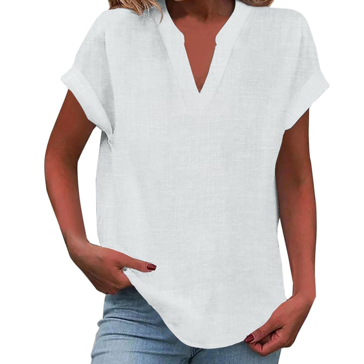 Relaxed fit V-neck blouse for women, short sleeves, perfect for casual spring fashion.