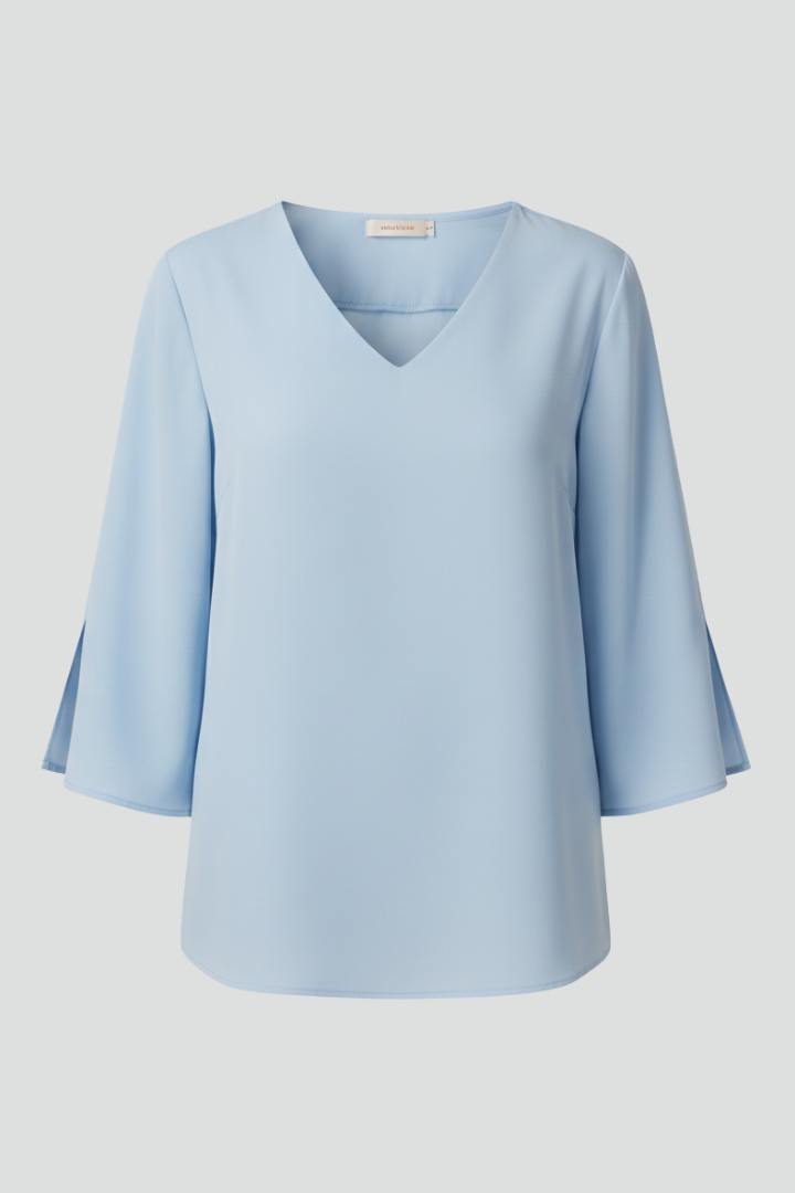Women's V-neck short sleeve blouse, loose fit, perfect for casual everyday wear. Elegant summer top.