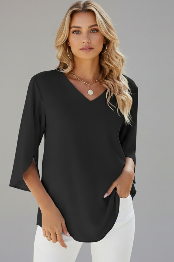 Summer-ready women's V-neck short sleeve blouse, chic and loose fitting, great for casual or elegant looks.