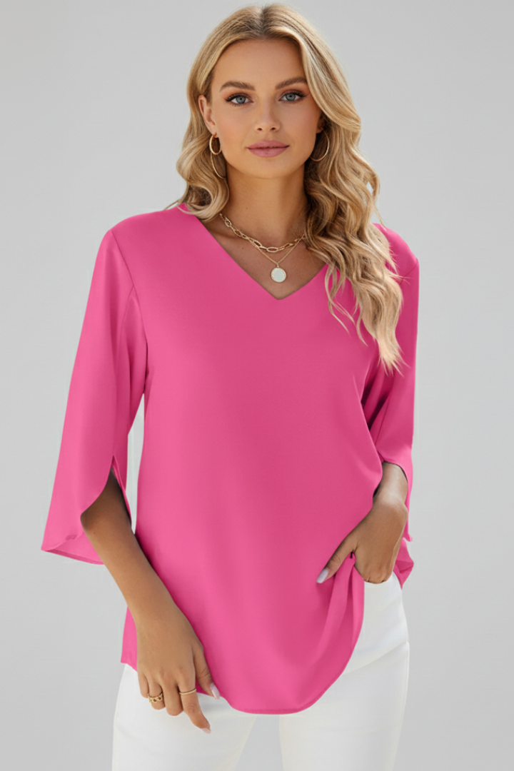 Effortless women's V-neck short sleeve blouse, versatile for office wear or casual outings. Fashionable top.