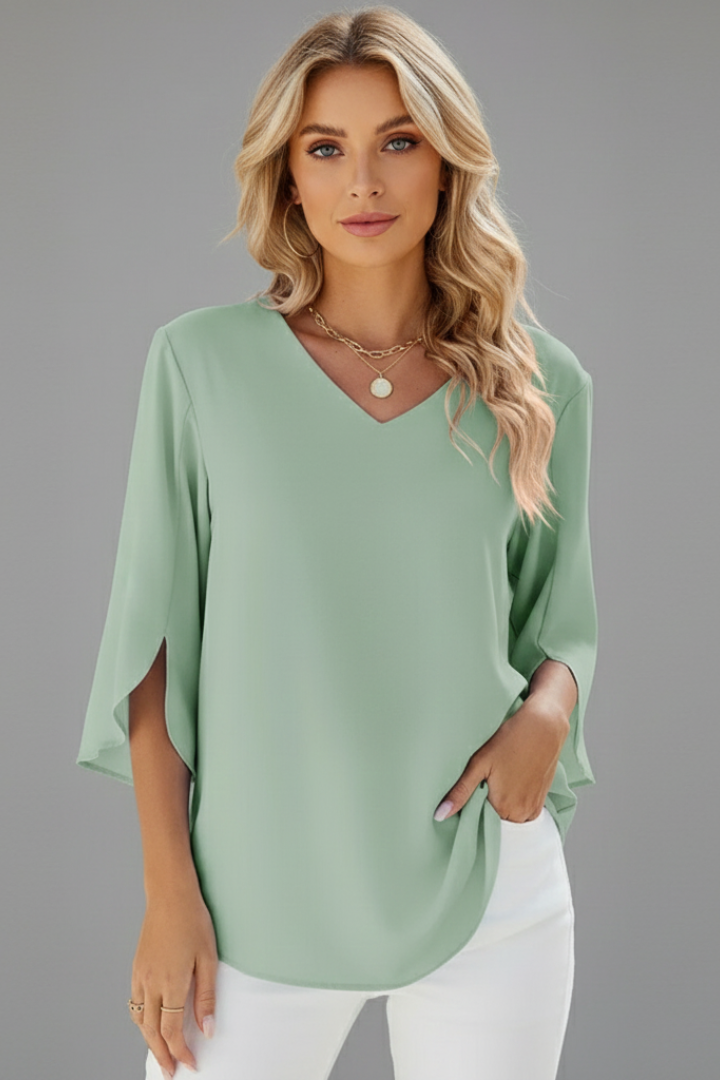 Comfortable women's V-neck short sleeve blouse, loose fit, ideal for effortless everyday style & workwear.
