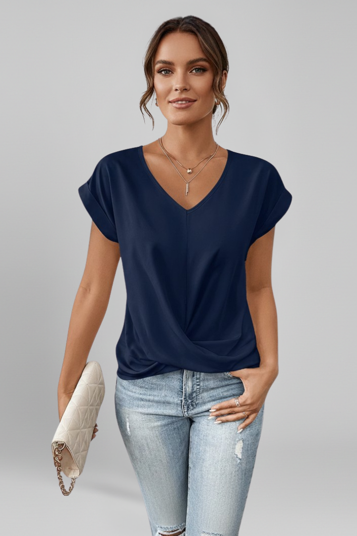 Women's V-neck short sleeve blouse with a simple, relaxed fit. Effortless comfort & style.