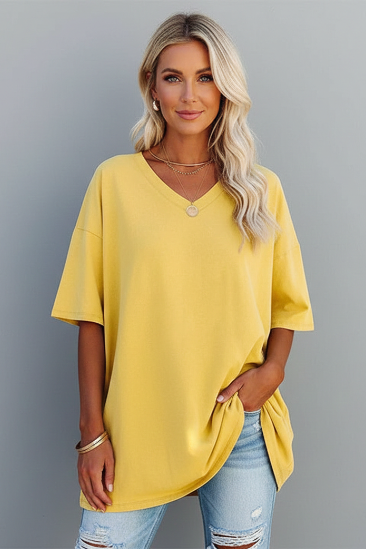 Front view of women's V-neck t-shirt, loose fit, short sleeves, perfect for everyday comfort.
