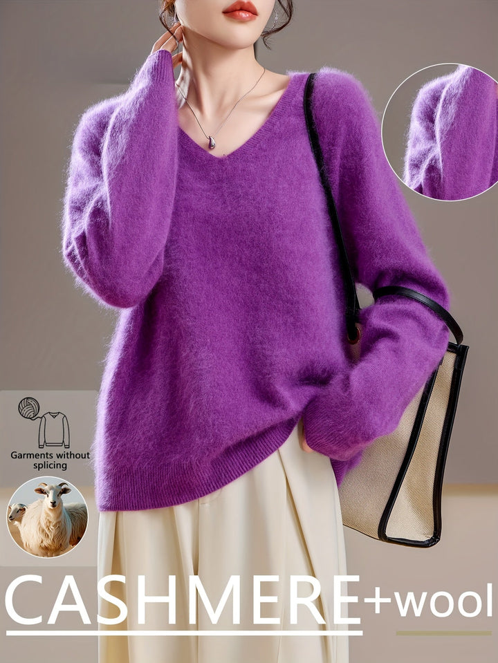 Chic women's v-neck sweater, comfortable & versatile, perfect autumn layering piece.