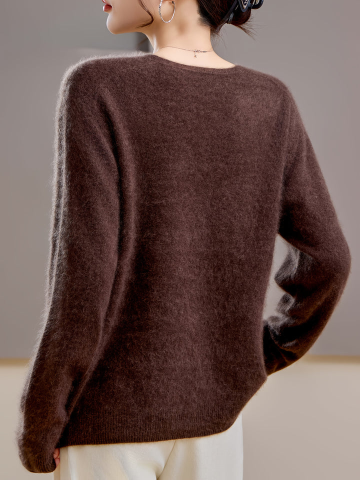 Oversized v-neck sweater, women's cozy wear, perfect for chic layering & relaxed style.