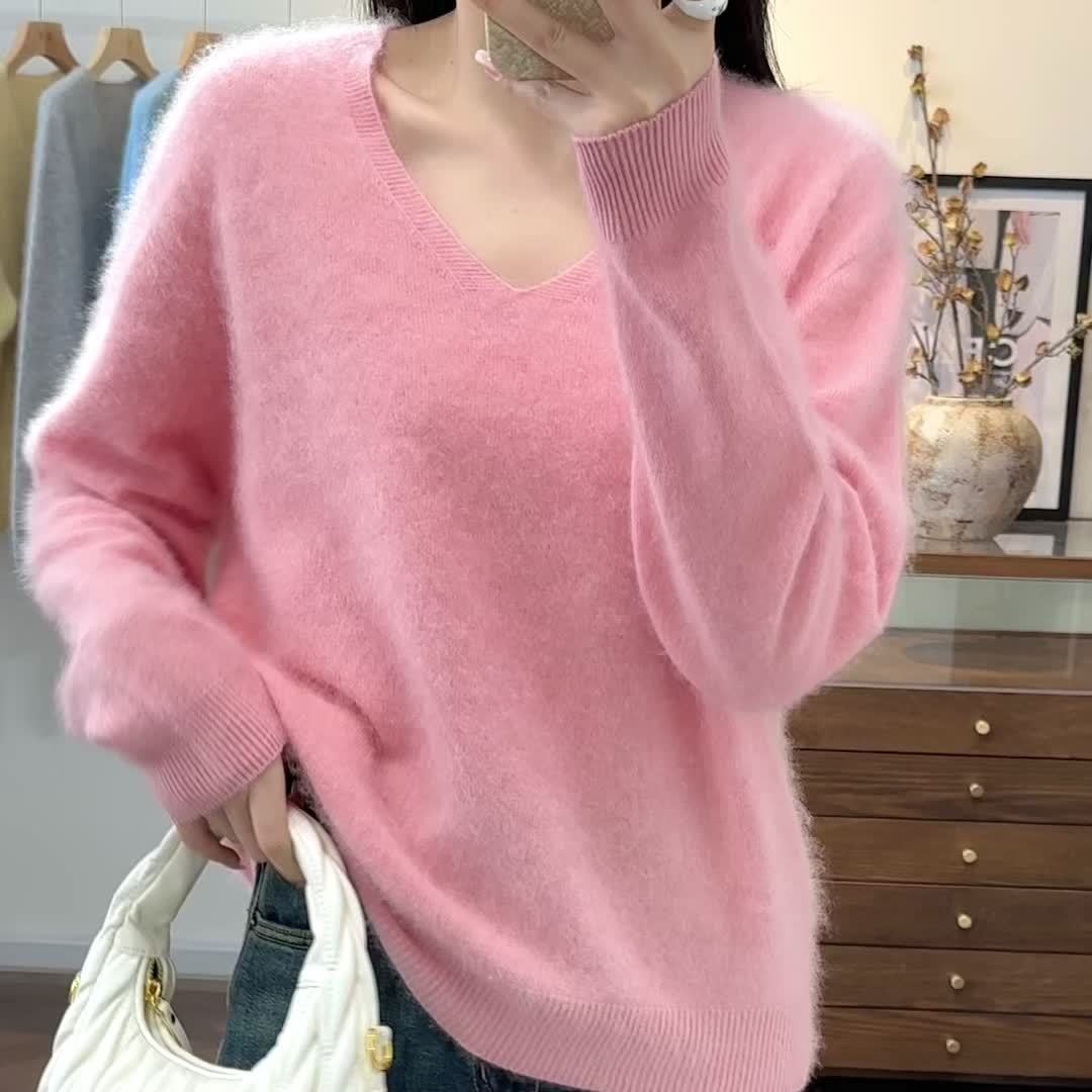 Versatile women's v-neck sweater, oversized fit, perfect cozy wear & effortless style.