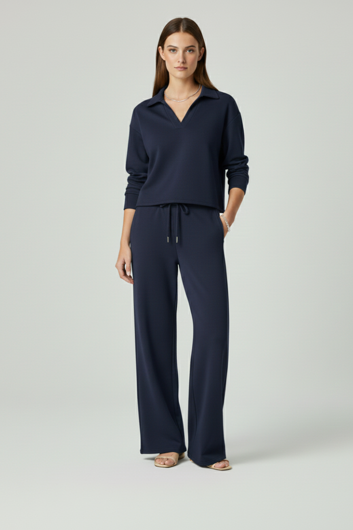 Fashionable women's lounge set with a V-neck top and wide-leg trousers, offering ultimate comfort and style.