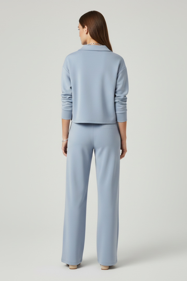 Stylish women's matching set: a V-neck top and wide-leg trousers, ideal for casual chic and versatile fashion.