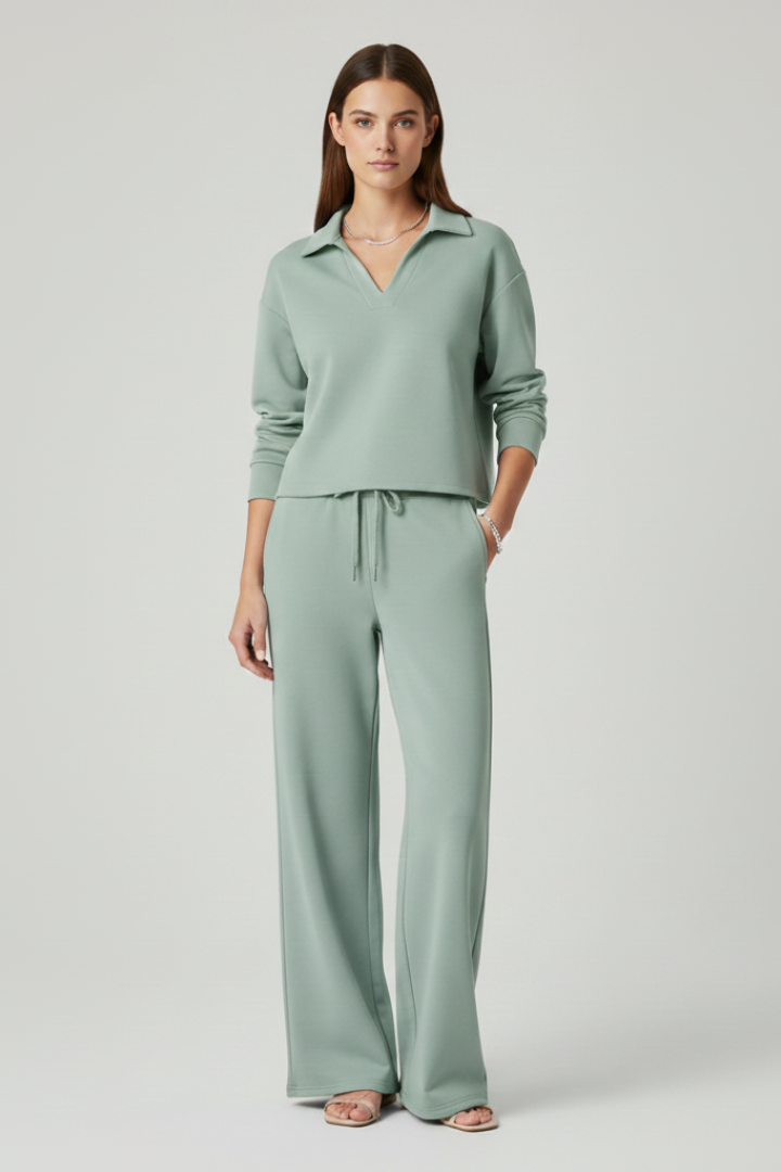 Elegant women's two-piece outfit featuring a V-neck top and comfortable wide-leg trousers for everyday style.