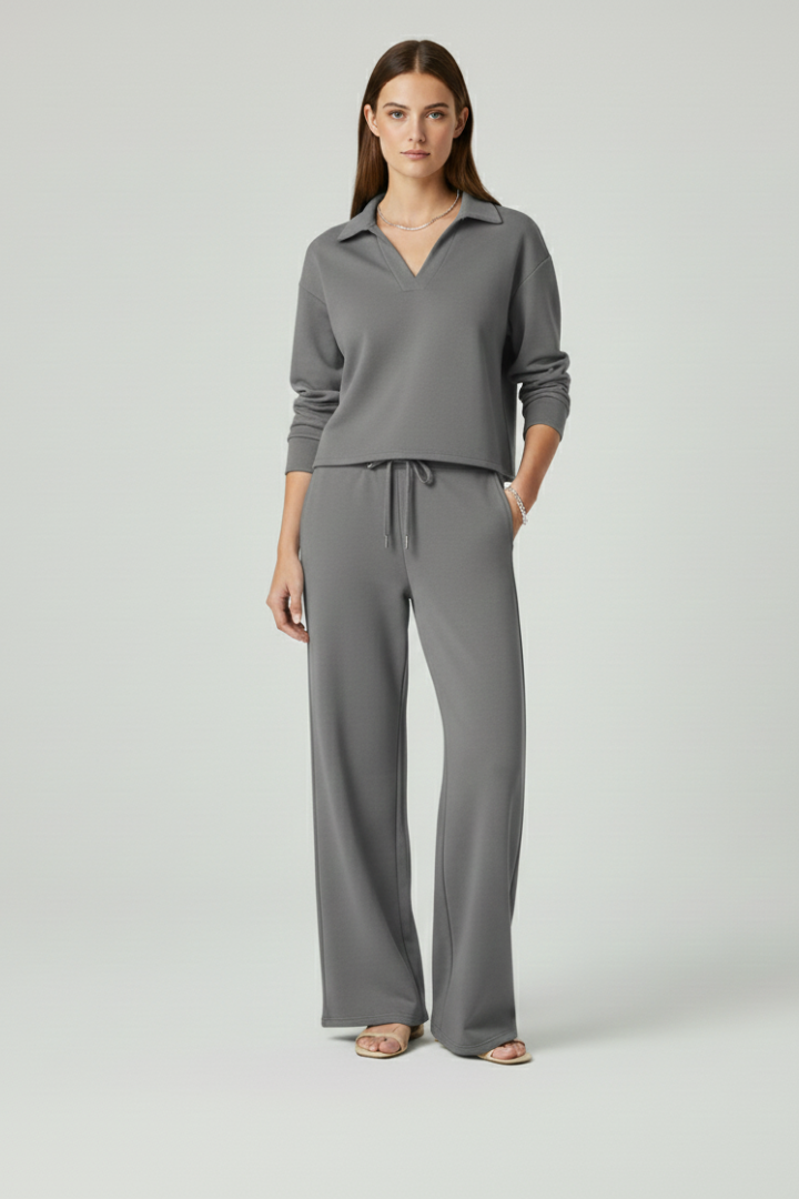 Women's comfortable two-piece set, a V-neck top paired with wide-leg trousers, great for lounge or casual chic.