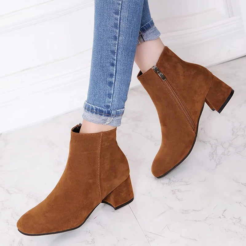 Women's versatile ankle boots with sturdy block heel, practical side zip, perfect for everyday casual style.