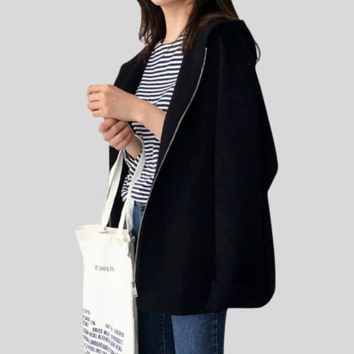 Women's versatile hooded jacket with zipper closure. Ideal for everyday comfort & casual outerwear. Long sleeve design.