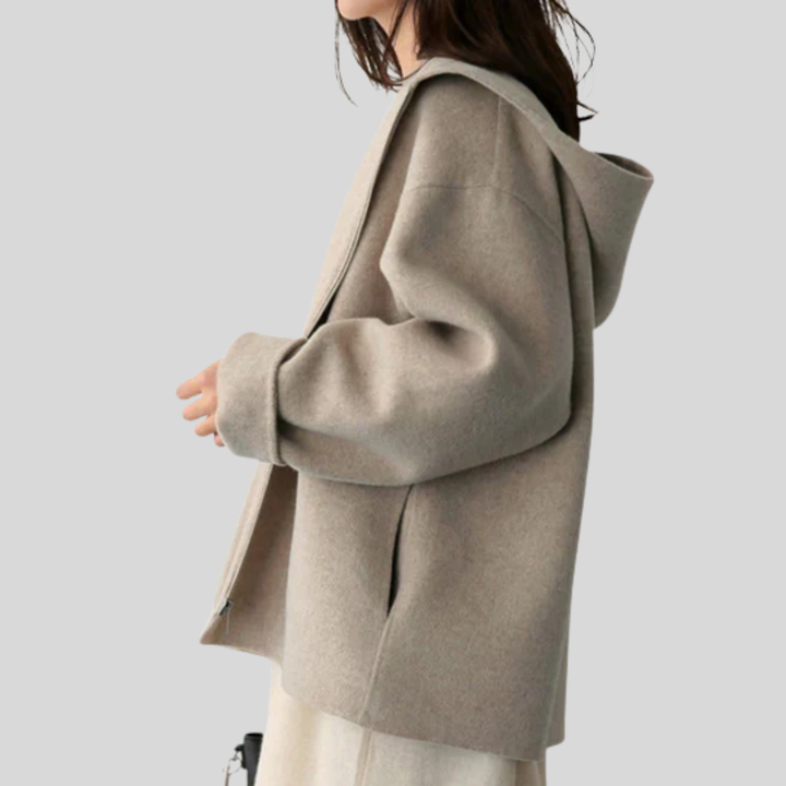 Stylish women's hooded zipper jacket. Practical outerwear for casual fashion & everyday wear. Comfortable long sleeve design.