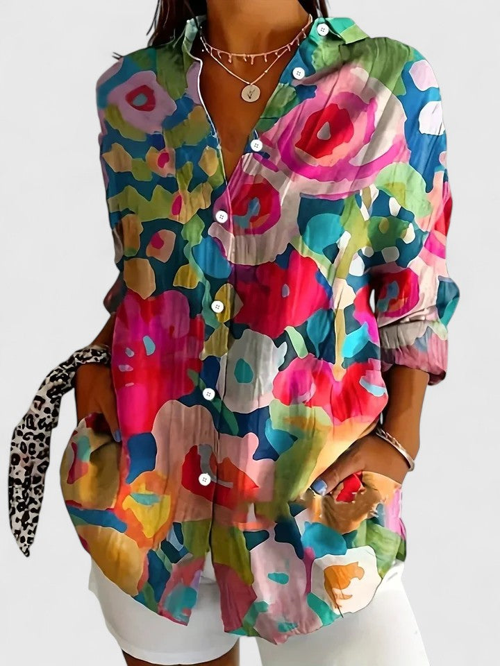 Chic women's printed blouse, offering effortless style. A versatile, vibrant top for any casual or elegant outfit.