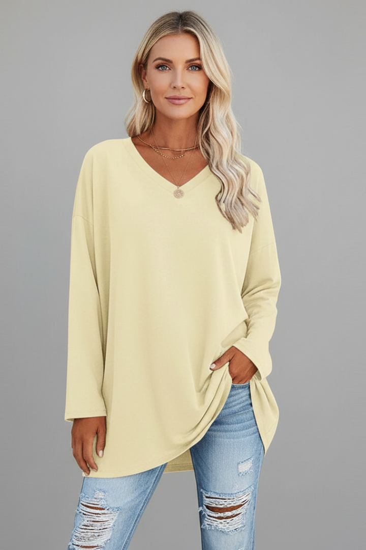 Women's loose-fit pull-on v-neck long sleeve top, offering maximum comfort and casual fashion for daily wear.