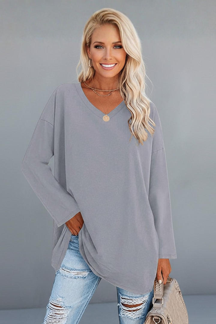 Basic solid color v-neck long sleeve top for women, providing versatile and comfortable style for everyday fashion.