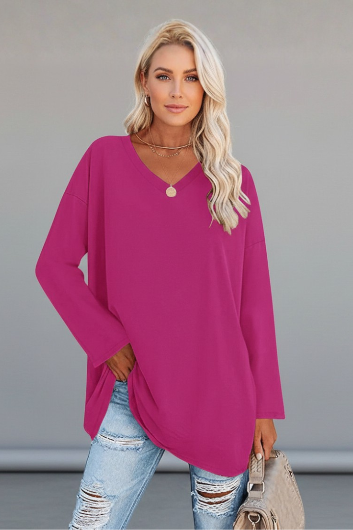 Women's seasonal long sleeve v-neck top, a versatile piece for effortless layering and comfortable everyday wear.