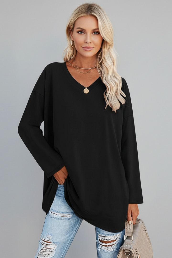 Close-up of a women's v-neck long sleeve top, showcasing its flattering and comfortable neckline for daily wear.