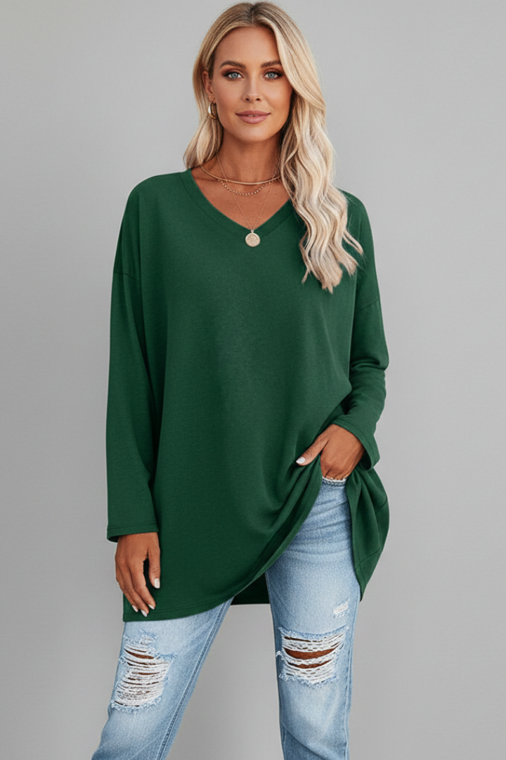 Textured fabric detail of a women's comfortable long sleeve v-neck top, ideal for versatile everyday style.