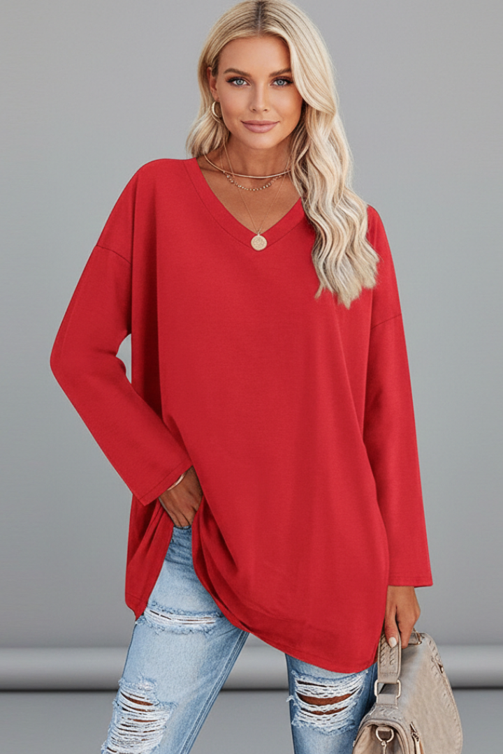 Women's versatile long sleeve v-neck top styled for everyday wear, offering effortless fashion and comfort.