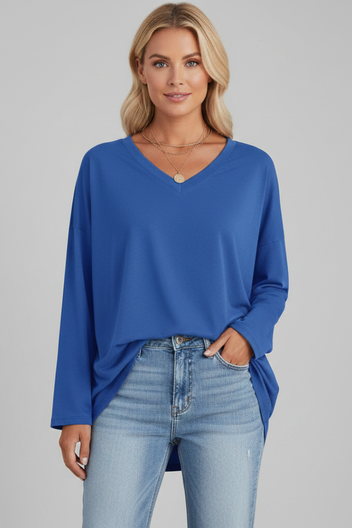 Detail of the long sleeve and cuff on a women's basic v-neck top, perfect for seasonal and versatile wear.