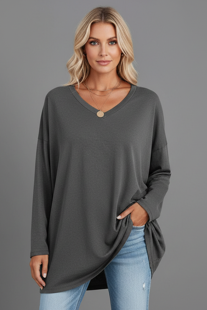 Neatly folded women's solid color v-neck long sleeve top, ready for versatile, comfortable everyday styling.