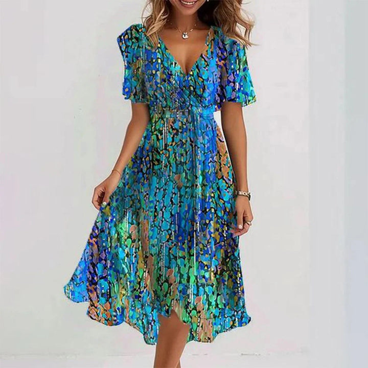 Colorful abstract midi dress, a vibrant statement piece for women's fashion.